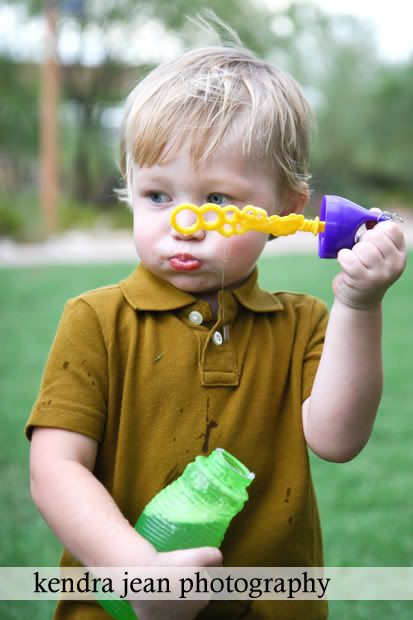 Scottsdale Child Photographer,Child blowing bubbles photos