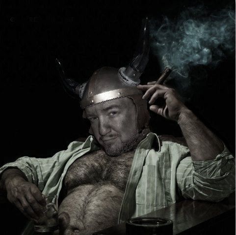 Perry The Last Viking, Scotch , cigar, and a viking helmet.